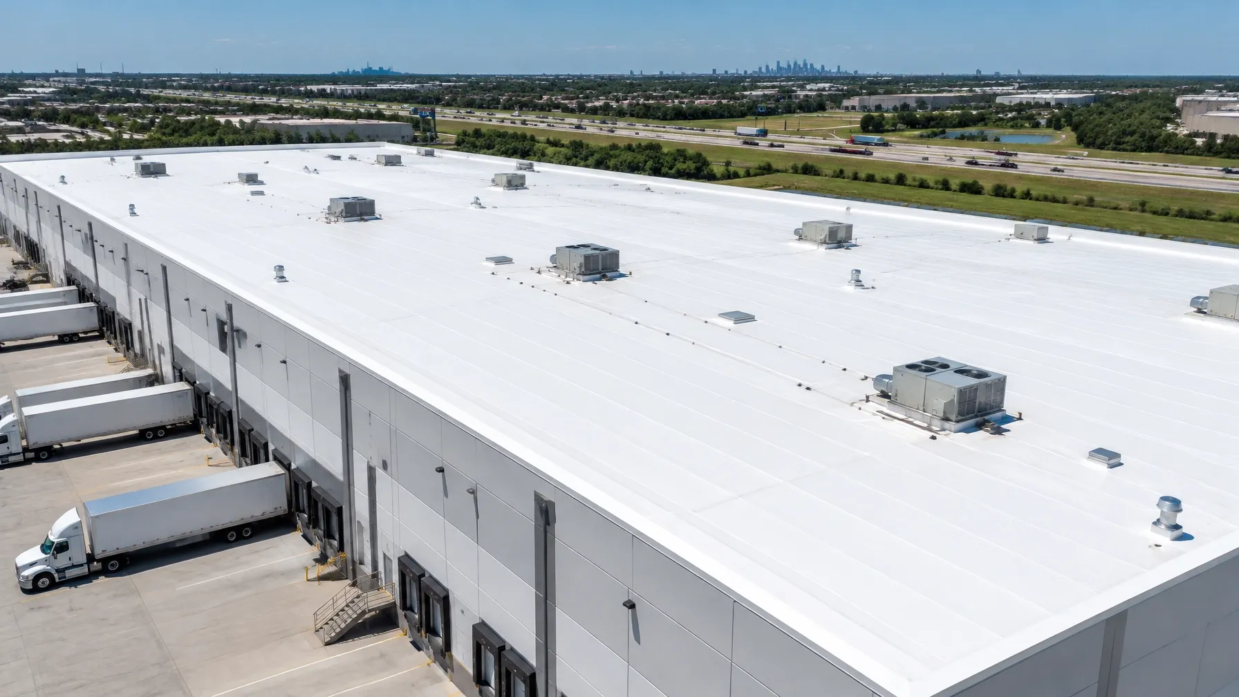 Wide commercial distribution roof along the Katy industrial corridor